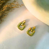 Bold Buckle Gold Earrings – Sleek & Sculptural Statement